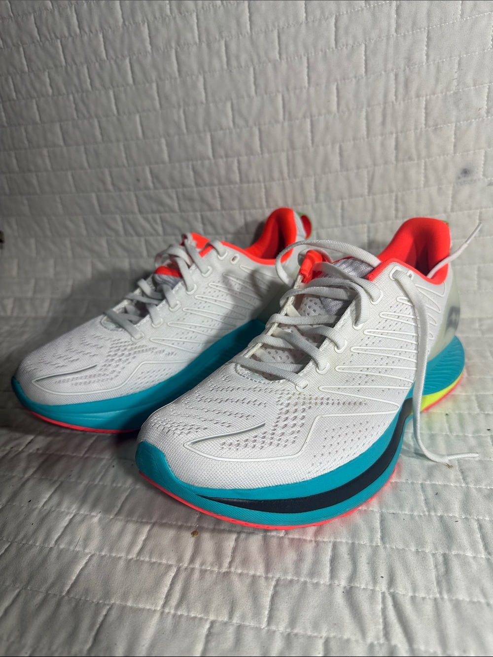 Saucony Endorphin Shift "Mutant" running shoe with a vibrant turquoise midsole